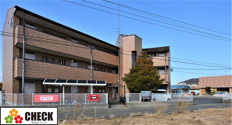 田川市大字伊田のマンションの建物外観