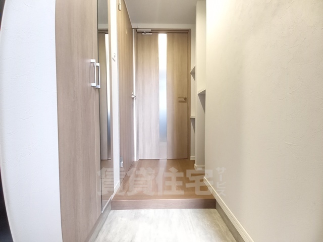 玄関　203号室写真