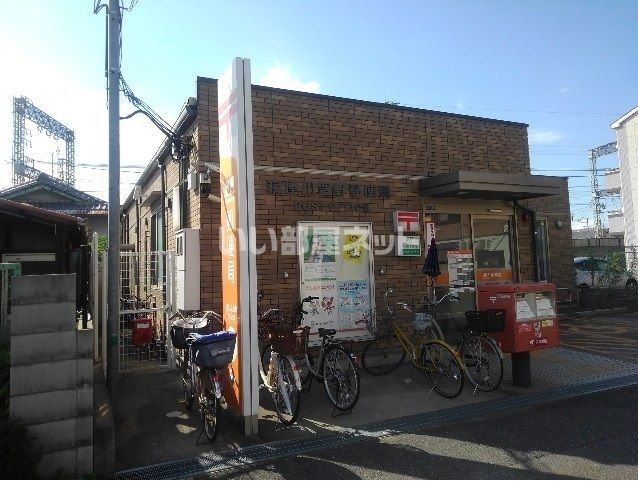 郵便局　寝屋川豊野郵便局（郵便局）まで1025m