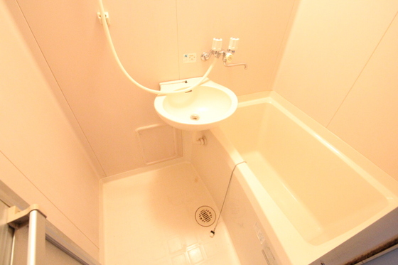 洗面設備　※別の部屋の写真です