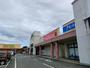 ドラックストア　ドラッグ・トップス新津店（ドラッグストア）まで1008m