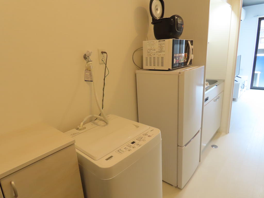 収納　(右)冷蔵庫(左)洗濯機 置き場