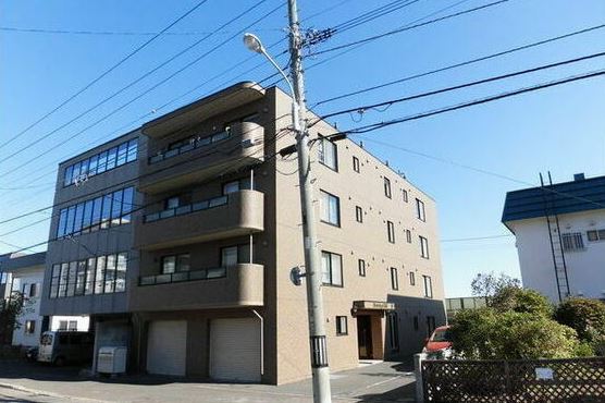 札幌市中央区南二十六条西のマンションの建物外観