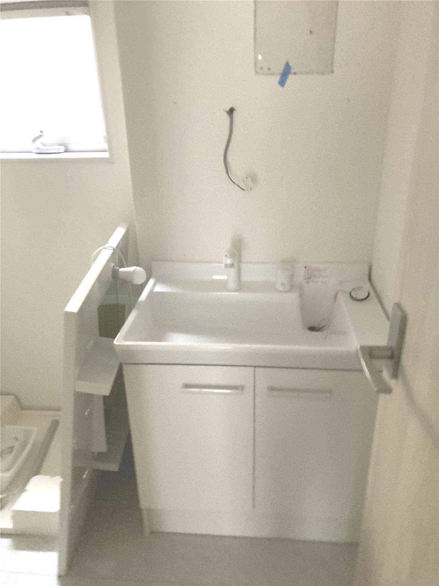 洗面設備　新築時の写真となります。