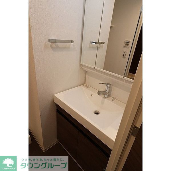 洗面設備　同建物内参考写真