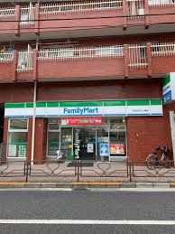 コンビニ　ファミリーマート 小石川ゆたて坂店（コンビニ）まで310m