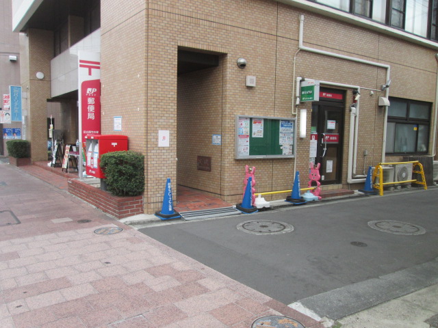 郵便局　足立西竹の塚郵便局（郵便局）まで242m