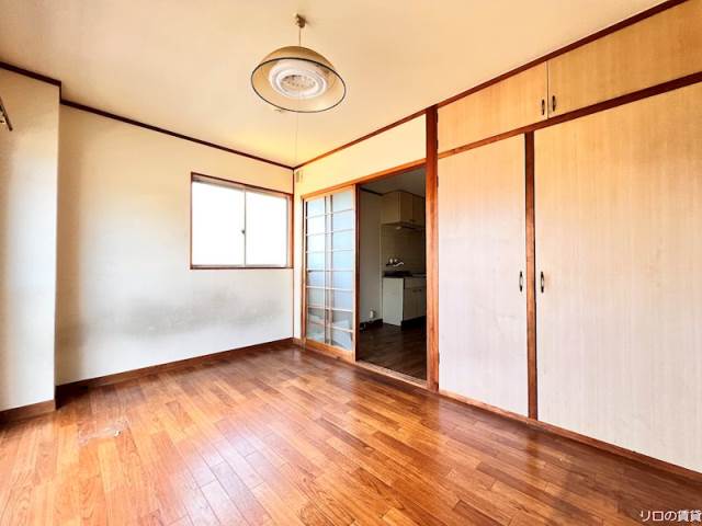 ゆにはコーポかなだIIの居間写真
