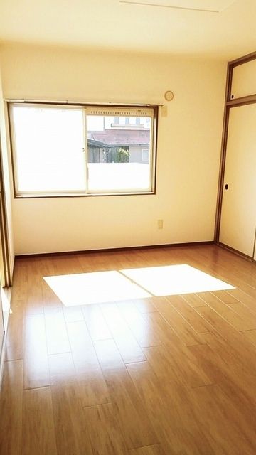 ニューシテイプラザ未来の居間写真
