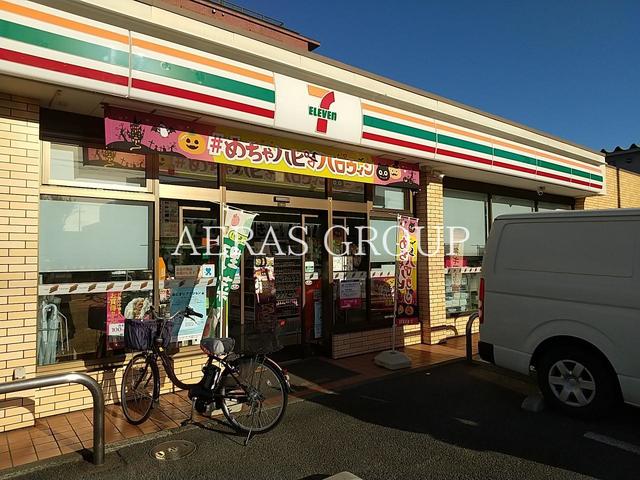 コンビニ　セブンイレブン市川堀之内店（コンビニ）まで744m