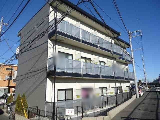 【松戸市上矢切のマンションの建物外観】