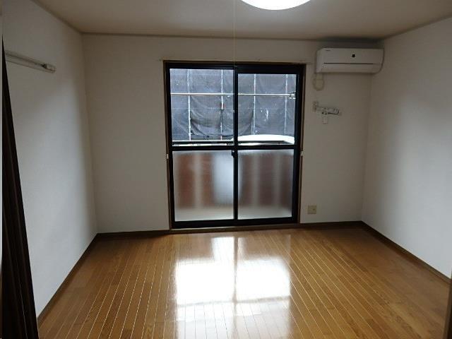 トゥインクルコート文化町11番館の居間写真