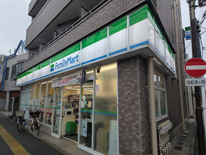 コンビニ　ファミリーマート 上中里三丁目店（コンビニ）まで422m