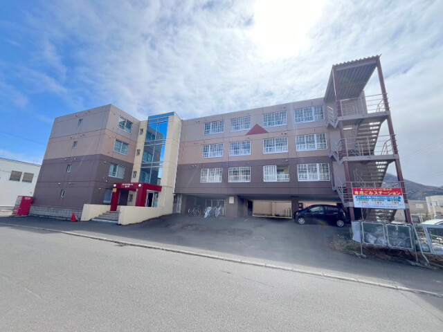 札幌市手稲区西宮の沢二条のマンションの建物外観