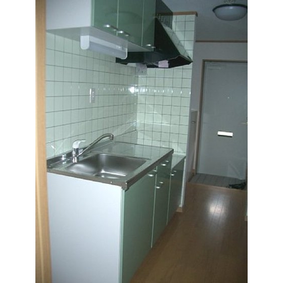 キッチン　パステルグリーンのタイルが素敵なゆったり