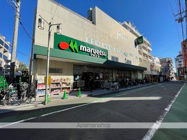 コンビニ　ファミリーマート（コンビニ）まで521m