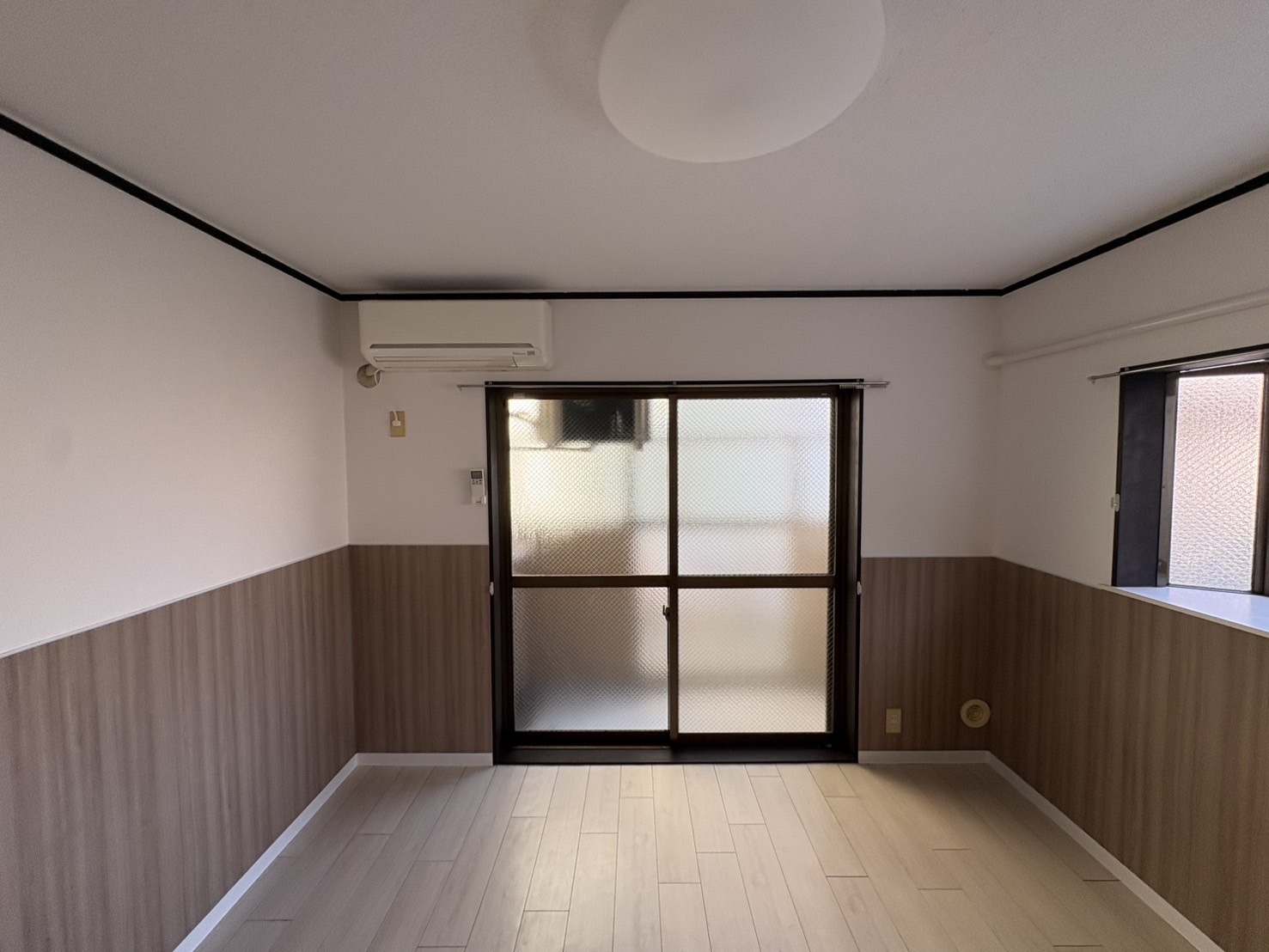 リビエール牛田新町の居間写真