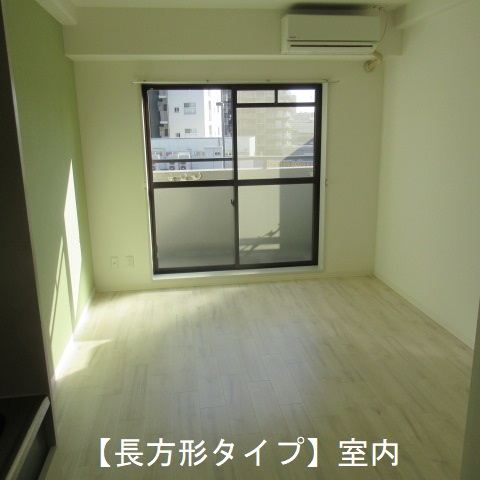 日建CCBuildingの居間写真