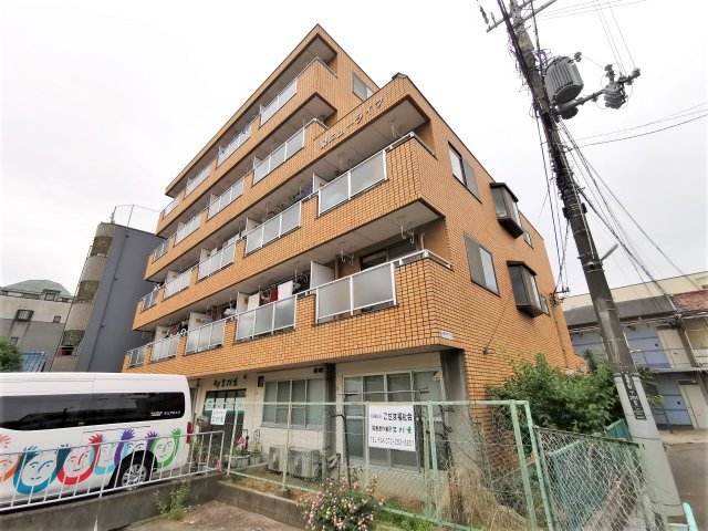 堺市北区東浅香山町のマンションの建物外観