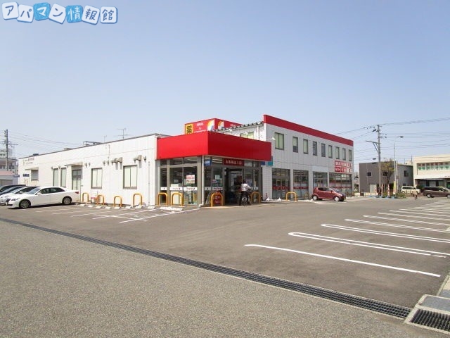 ドラックストア　ドラッグ・トップス馬越店（ドラッグストア）まで979m