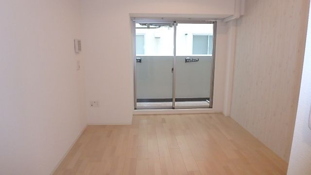 地下鉄堺筋線 長堀橋駅 徒歩3分 15階建 築8年の居間写真