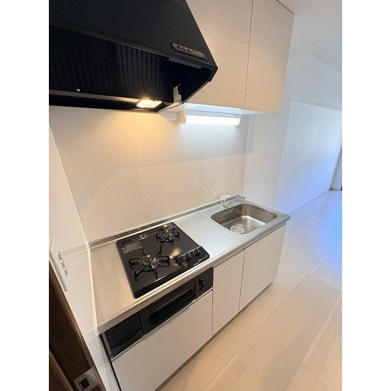 キッチン　同棟１Ｆ３号室写真