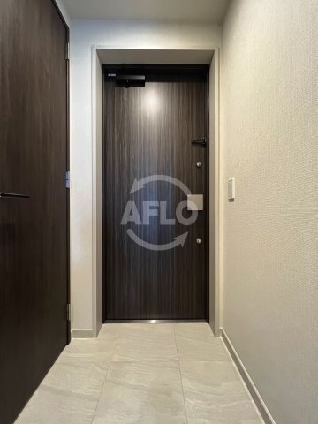 ウェリスタワー京町堀の玄関写真