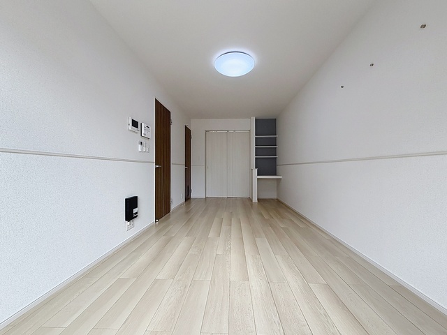 プロムナード春日2の居間写真