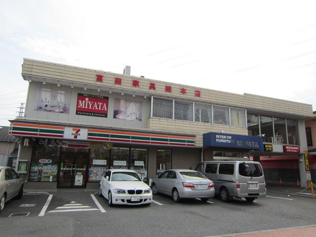 コンビニ　セブンイレブン（コンビニ）まで990m
