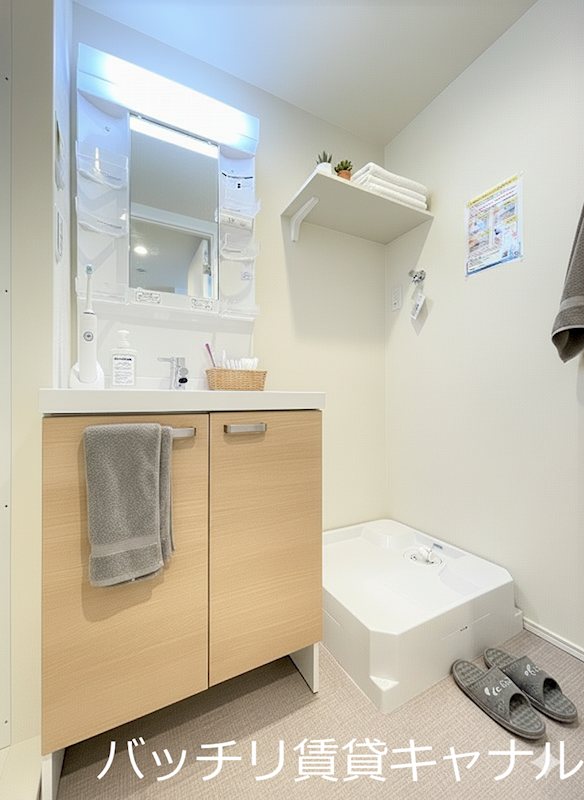 洗面設備　※モデルルーム写真の為、実際に家具はございません。