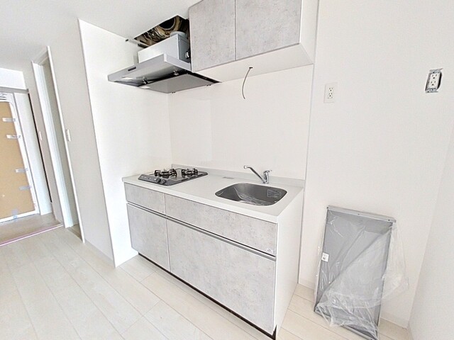 キッチン　建築中の２０２号の写真