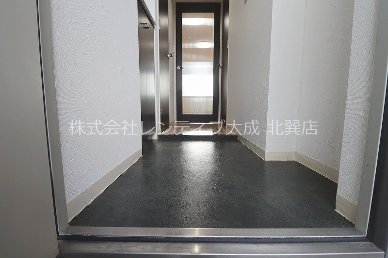 地下鉄中央線 緑橋駅 徒歩14分 10階建 築21年の玄関写真