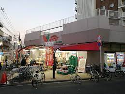 スーパー　コモディイイダ東十条店（スーパー）まで386m