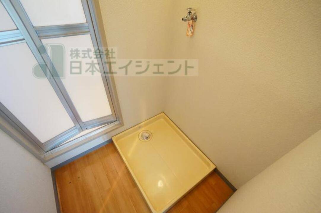 【松山市柳井町のマンションの洗面設備】