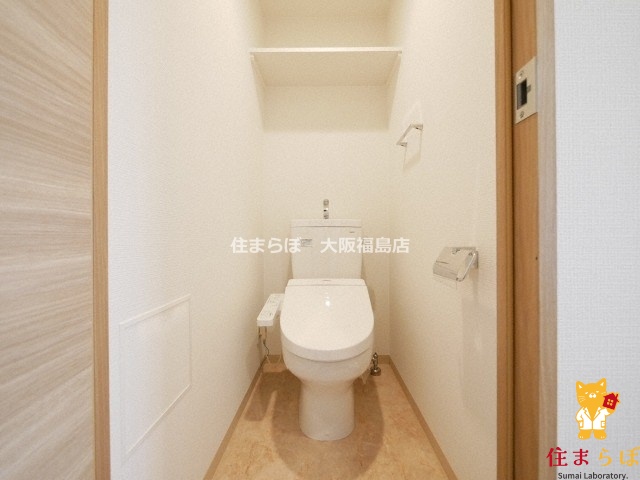 地下鉄御堂筋線 西中島南方駅 徒歩10分 10階建 築11年のトイレ写真