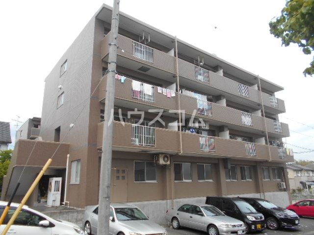 尾張旭市狩宿町のマンションの建物外観