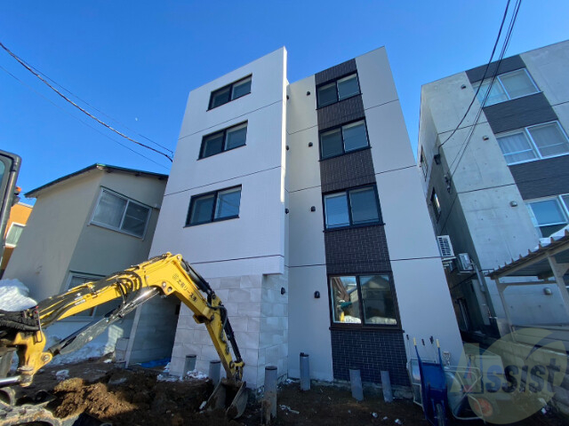 札幌市豊平区月寒西三条のマンションの建物外観