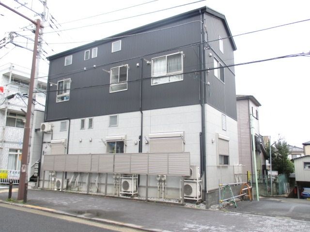 【日野市新井のアパートの建物外観】