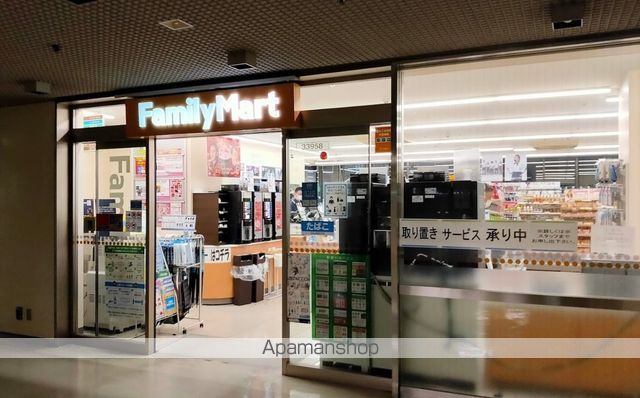 コンビニ　ファミリーマート（コンビニ）まで409m