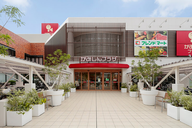 ショッピングセンター　かみしんプラザ（ショッピングセンター）まで220m