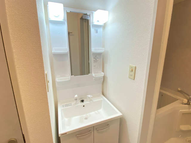 洗面設備　2022年撮影・202号室の写真