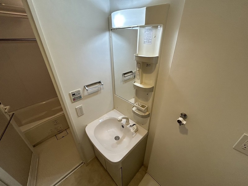 洗面設備　※２０６号室の写真です。