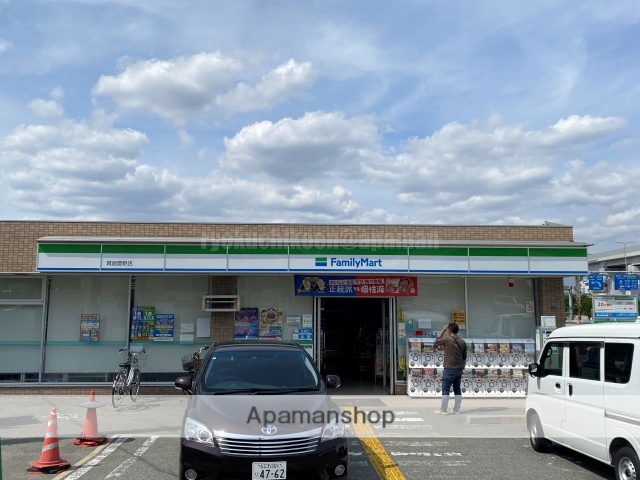 コンビニ　ファミリーマート箕面萱野店（コンビニ）まで1086m