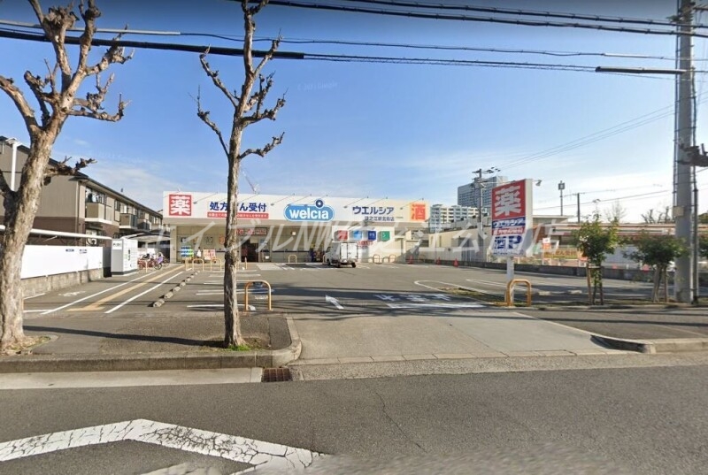 ドラックストア　ウエルシア住之江新北島店（ドラッグストア）まで398m