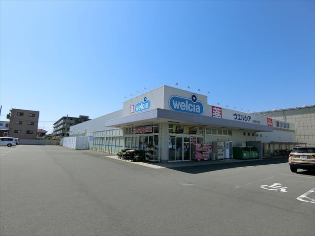 ドラックストア　ウエルシア沼津新沢田店（ドラッグストア）まで857m