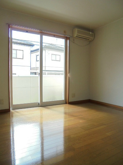 居室・リビング　※206号室のお写真です。