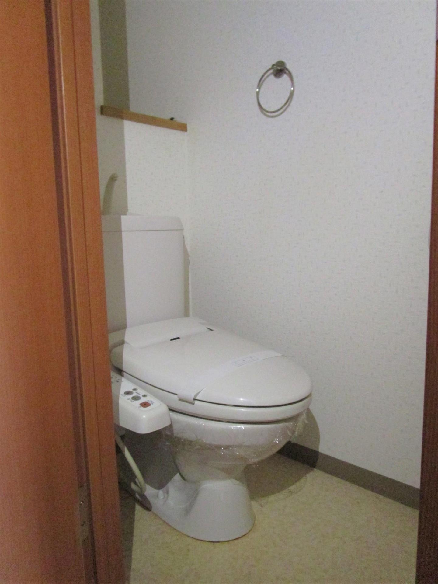 トイレ　洗浄機付き暖房便座