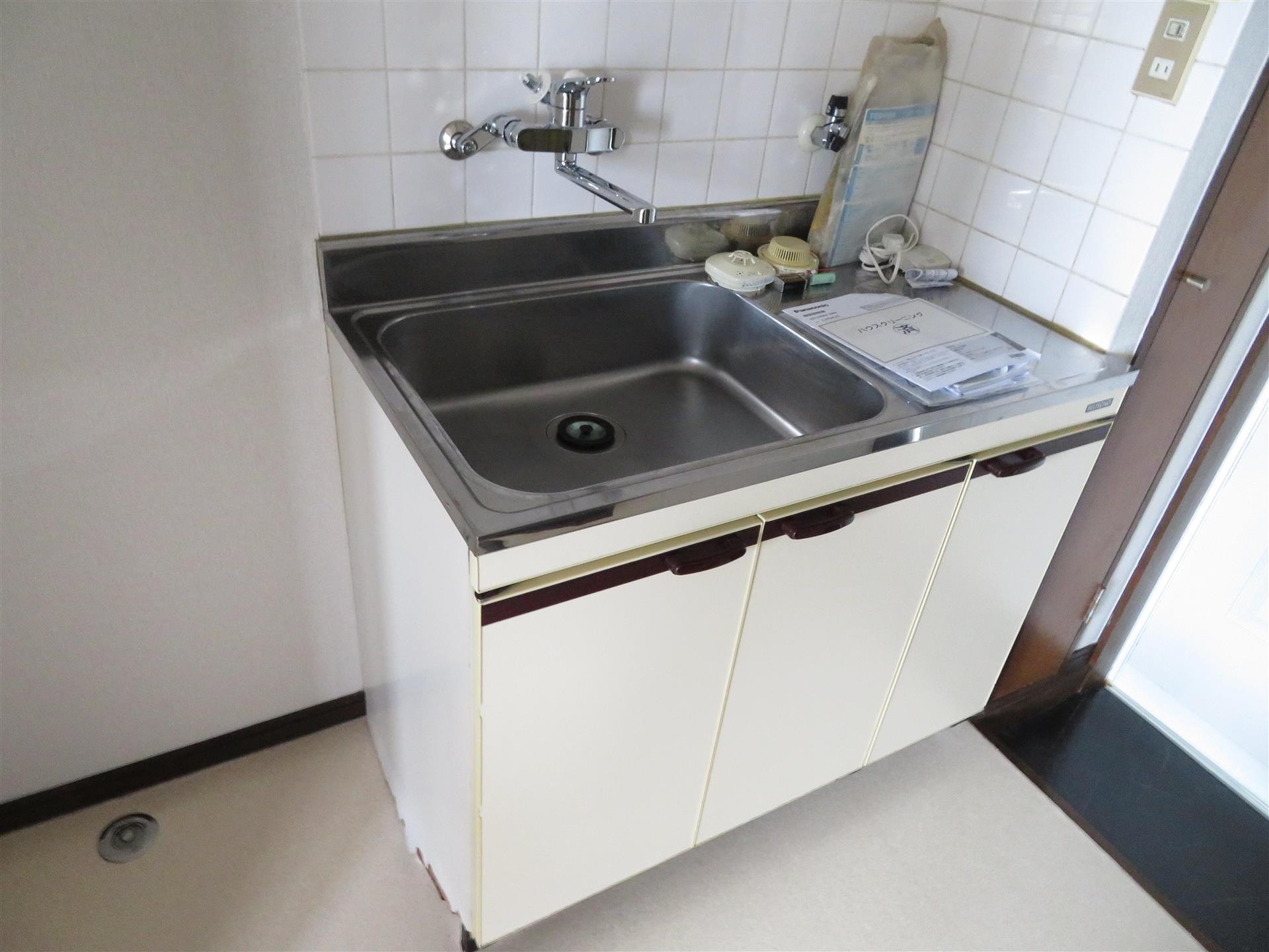 トレンチコート708棟のキッチン写真