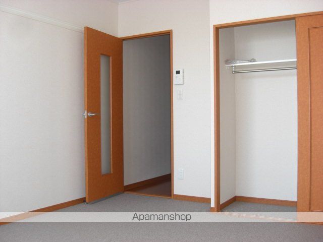 レオパレスオレンジヒルズの居間写真