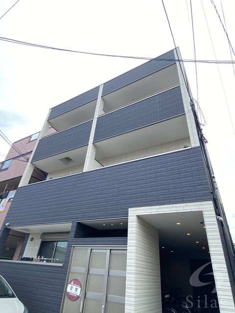 大阪市西淀川区竹島のアパートの建物外観